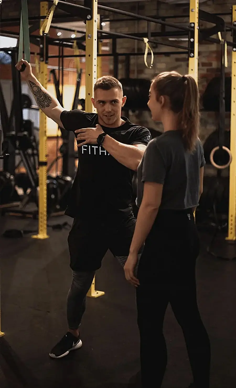 Coach reviewing a program with a client